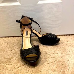 Black stiletto peep toe ankle strap shoes